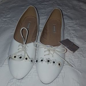 Laced ballet flats